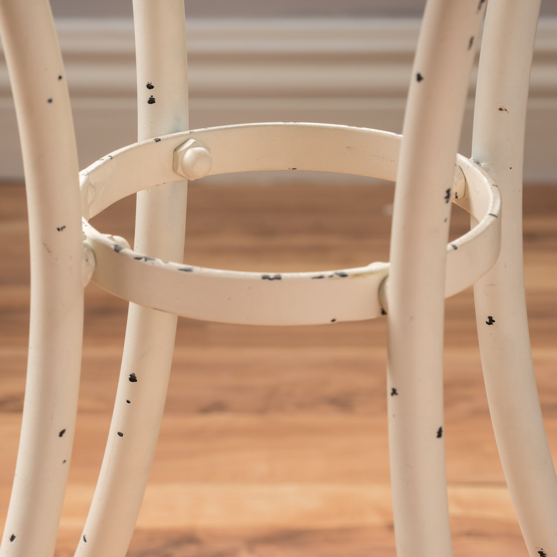 Atlanta Iron Bistro Chair White Leg and Brace Close-Up Detail | KOSSMAI